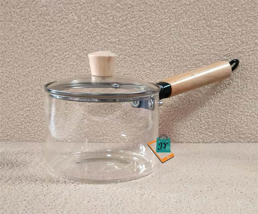 High Borosilicate Glass Single Handle Soup Pot with Lid (Category: Cookware & Accessories) located in Manila. Submitted by chaionlineshop (Listing ID 1462993843, Image 3). Description: - Clear glass soup pot with a single wooden handle. - Made from durable high borosilicate glass. - Ideal for both cooking and serving your favorite dishes. - Easy to clean and adds a stylish touch to your kitchen. - Box indicates 'High boron glass'..