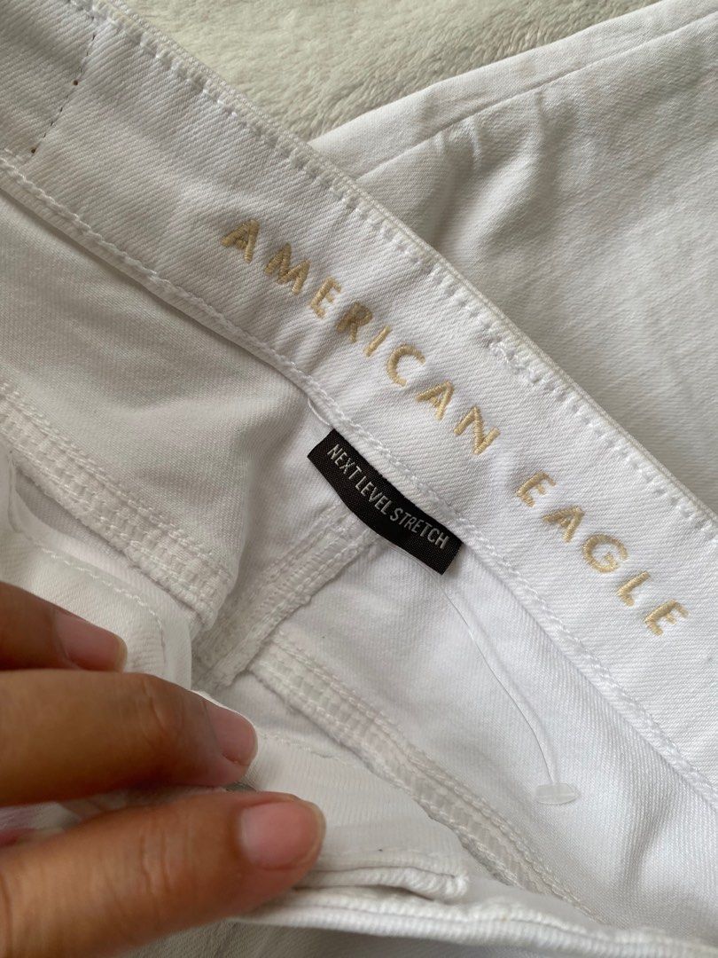 Strechable White Denim Jeans Size 27 (Category: Jeans) located in Cavite. Submitted by jaydaascollection (Listing ID 1462887921, Image 3). Description: - White high-waisted jeans - Brand: American Eagle -Size 27-30 - Features Next Level Stretch for ultimate comfort - Classic five-pocket styling - Versatile for everyday wear - Easily pairs with any top -Once Used.