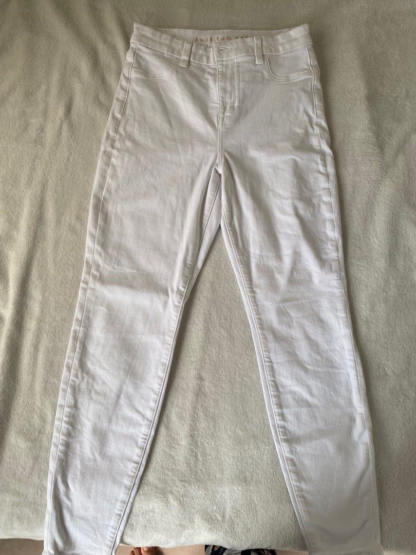Strechable White Denim Jeans Size 27 (Category: Jeans) located in Cavite. Submitted by jaydaascollection (Listing ID 1462887921, Image 1). Description: - White high-waisted jeans - Brand: American Eagle -Size 27-30 - Features Next Level Stretch for ultimate comfort - Classic five-pocket styling - Versatile for everyday wear - Easily pairs with any top -Once Used.