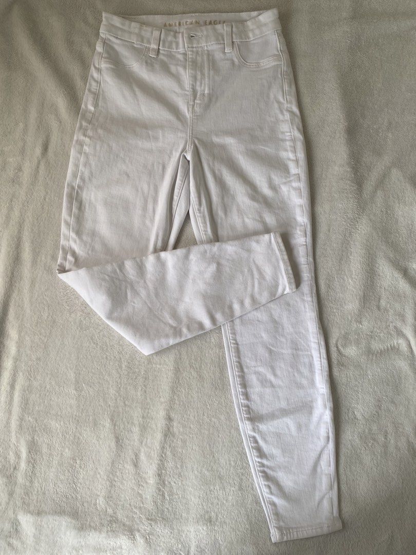 Strechable White Denim Jeans Size 27 (Category: Jeans) located in Cavite. Submitted by jaydaascollection (Listing ID 1462887921, Image 2). Description: - White high-waisted jeans - Brand: American Eagle -Size 27-30 - Features Next Level Stretch for ultimate comfort - Classic five-pocket styling - Versatile for everyday wear - Easily pairs with any top -Once Used.