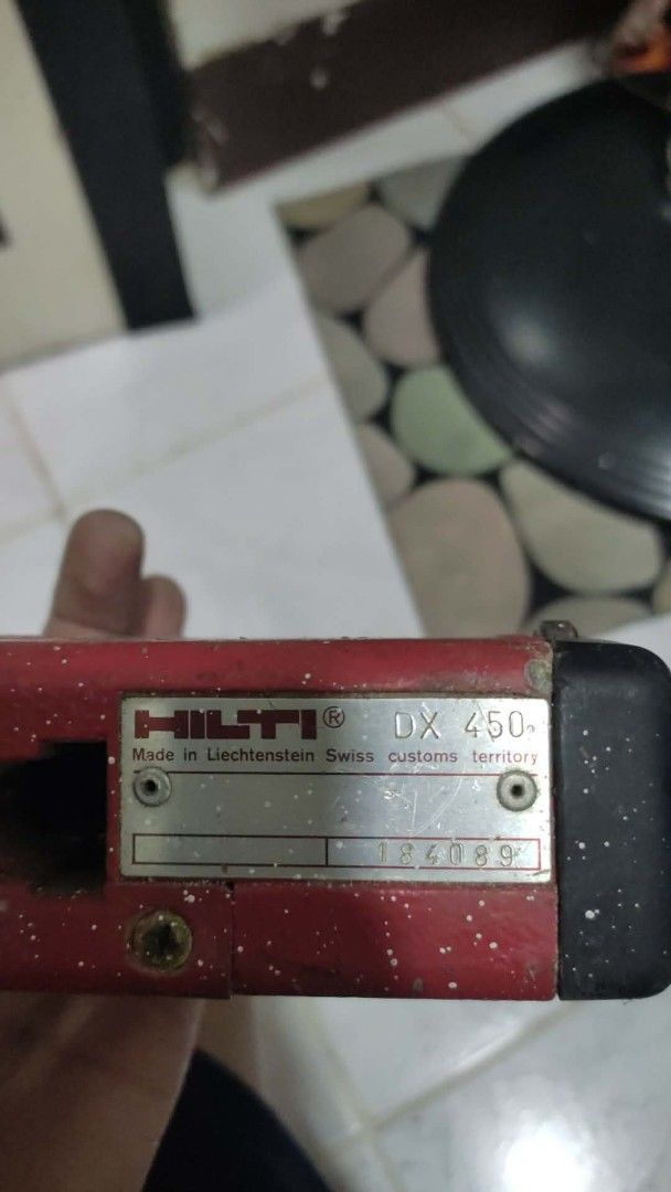 Hilti DX 450 Powder Actuated Tool (Category: Construction Tools & Equipment) located in Caloocan City. Submitted by arieljose212086 (Listing ID 1463114931, Image 1). Description: - Hilti DX 450 Powder-Actuated Tool - Made in Liechtenstein (Swiss customs territory) - Serial Number: 184089 - Robust and functional tool - Ideal for construction and DIY projects.