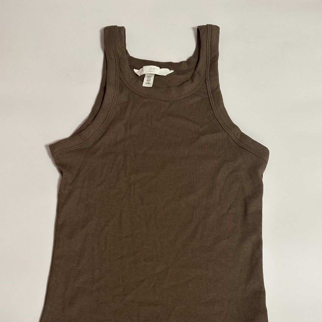 H&M Basics Ribbed Tank Top (Brown) (Category: Sleeveless) located in Quezon City. Submitted by gg.finds (Listing ID 1462943522, Image 2). Description: - new, only worn once, no tag - lightweight and breathable material - ribbed, racerback design - size is Medium on tag - color is Brown (true to color in first and third photos) - rfs: decluttering, not my size.