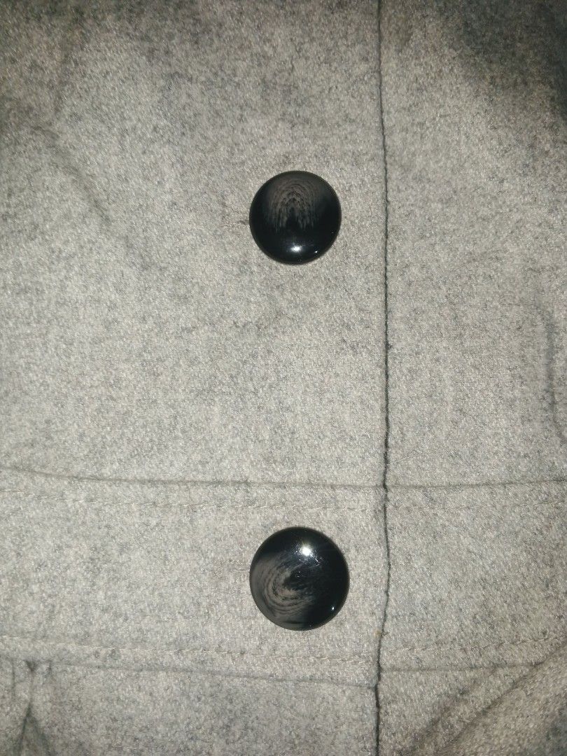 H&M Grey Wool Blend Coat with Button Detail (Category: Coats, Jackets and Outerwear) located in Manila. Submitted by icamalicdem29 (Listing ID 1463091882, Image 3). Description: - H&M Grey Coat - Wool Blend Material - Flattering Cinched Waist - Button-Up Front - Cute Rounded Collcar - Front Pockets - Ideal for Cooler Weather - Shoulder to Hem Length: Approx. 31 inches.
