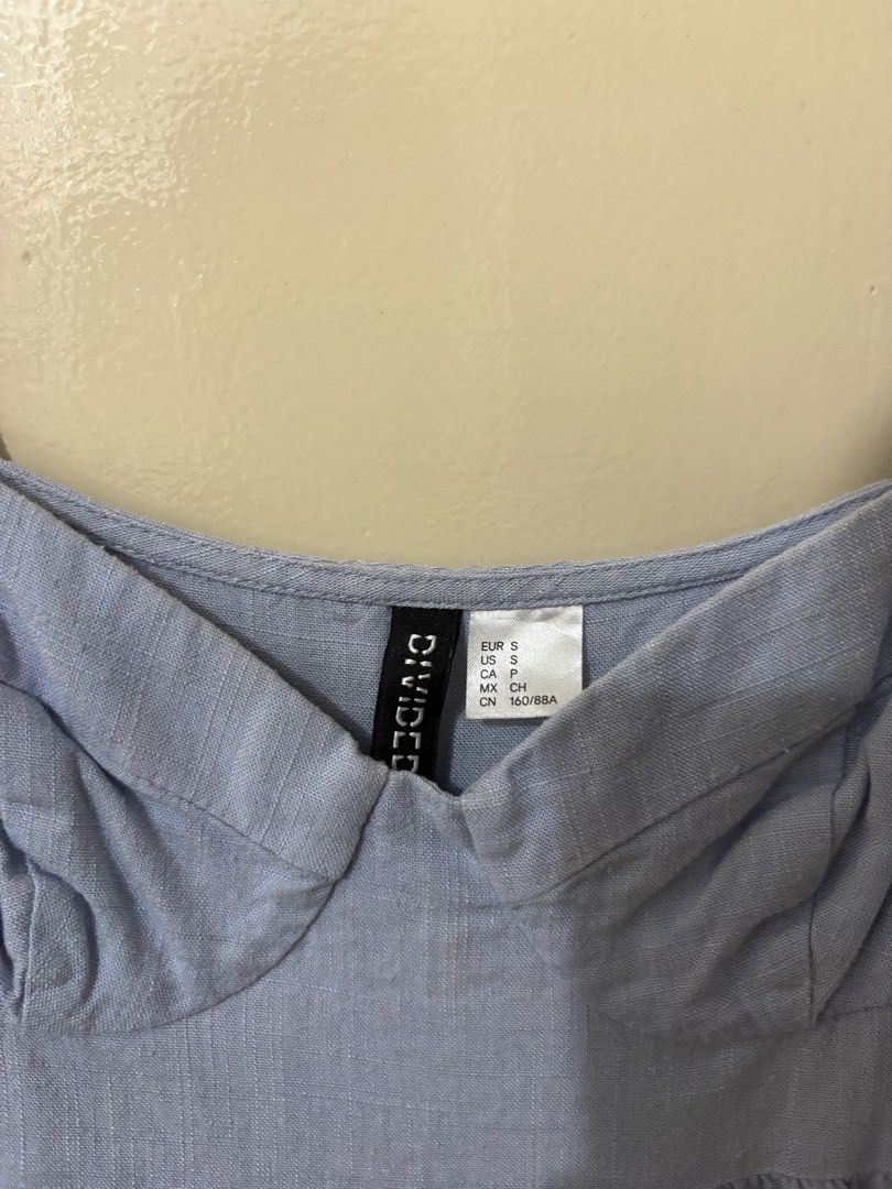 H&M Light Blue Bustier Babydoll Top (Category: Sleeveless) located in Manila. Submitted by outtacloset (Listing ID 1463010984, Image 2). Description: - Cute light blue babydoll top from H&M - Features adjustable straps - Sweetheart neckline - Subtle textured fabric - Versatile for casual wear or dressing up - Pairs well with jeans or skirts.