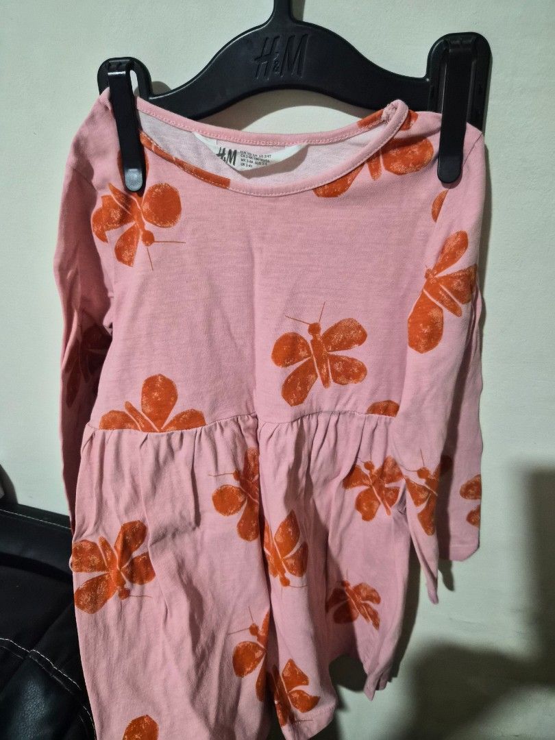 H&M Pink Butterfly Dress (Category: Dresses) located in San Pablo. Submitted by luckycharm2609 (Listing ID 1463014786, Image 1). Description: - Cute pink dress from H&M - Features an all-over orange butterfly print - Ruffled detail at the waist - Comfortable and stylish for everyday wear.