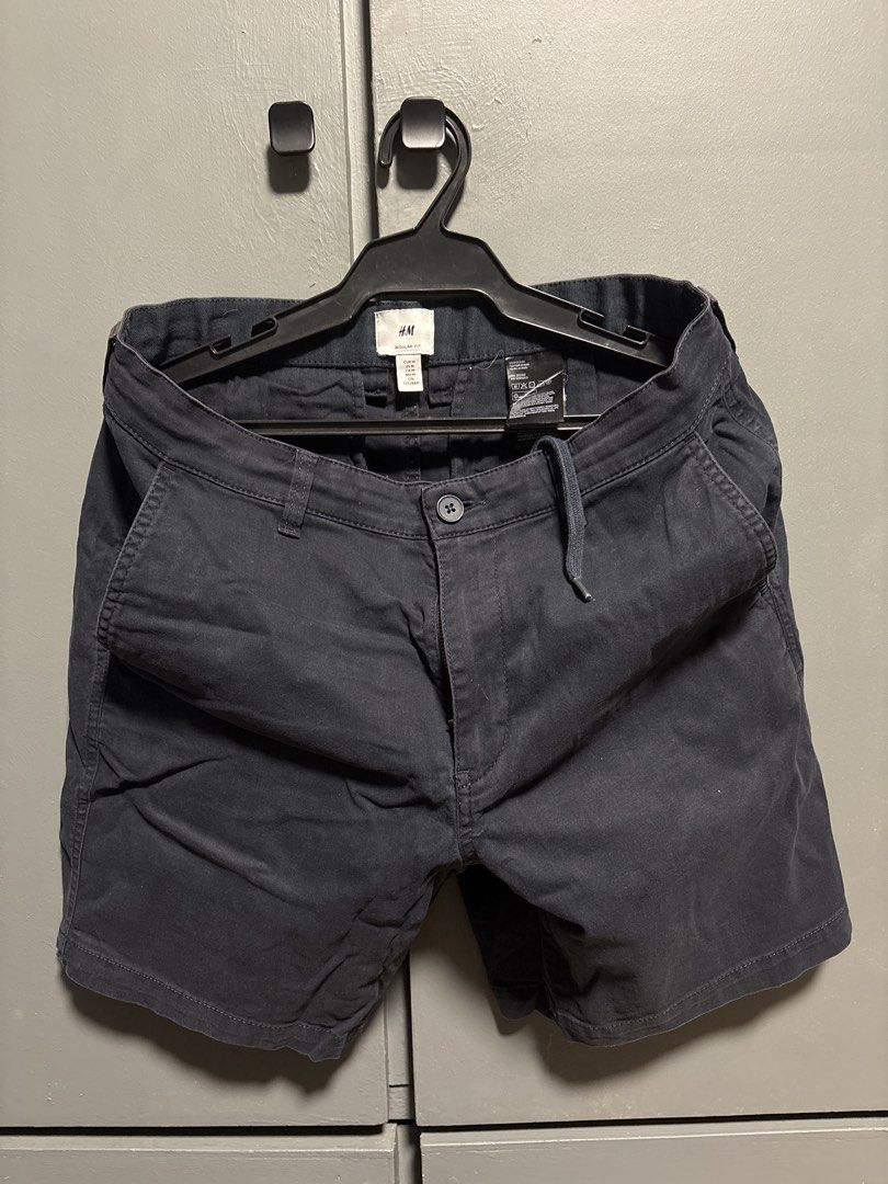 H&M Regular Fit Dark Grey Chino Shorts (Category: Shorts) located in Manila. Submitted by allenv.2k (Listing ID 1463034445, Image 1). Description: - Dark grey H&M chino shorts - Regular fit with drawstring waist - Button and zip closure - Two side pockets and two back pockets - Ideal for casual wear, pairs well with tees or polos.
