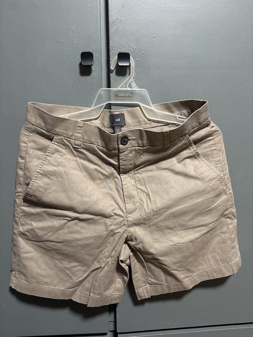 H&M Relaxed Fit Chino Shorts (Category: Shorts) located in Manila. Submitted by allenv.2k (Listing ID 1463033764, Image 1). Description: - Brand: H&M - Style: Chino Shorts - Fit: Relaxed - Color: Neutral Beige/Tan - Closure: Button and Zip - Pockets: Two side, two back - Ideal for: Casual outings, everyday wear.