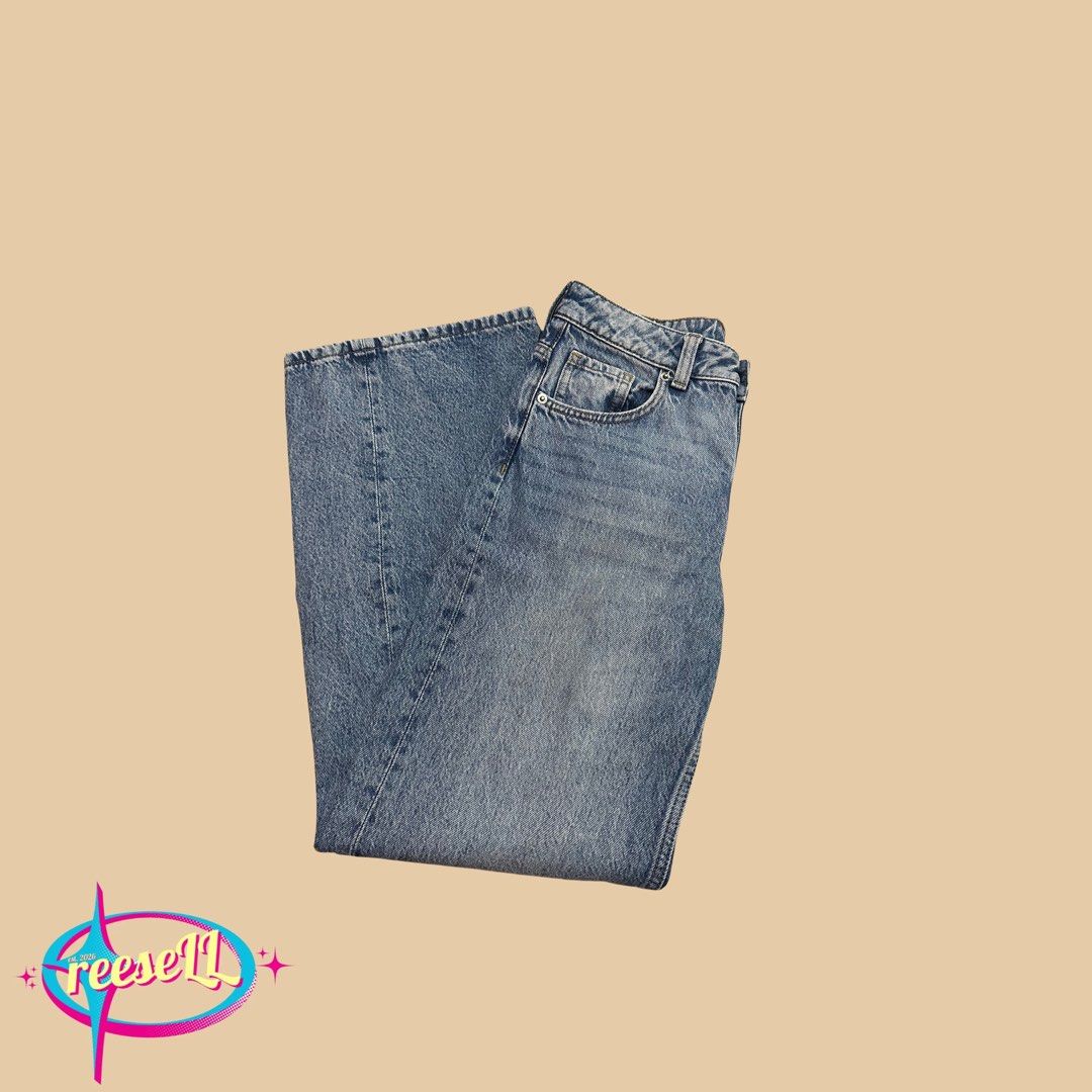 H&M Wide Leg Jeans (Category: Jeans) located in Iloilo. Submitted by reesespuffs_ (Listing ID 1463029395, Image 1). Description: - Classic blue wash jeans - High-waisted fit - Wide leg opening - Super comfy and stylish - Versatile for dressing up or down - Easy to pair with any top.