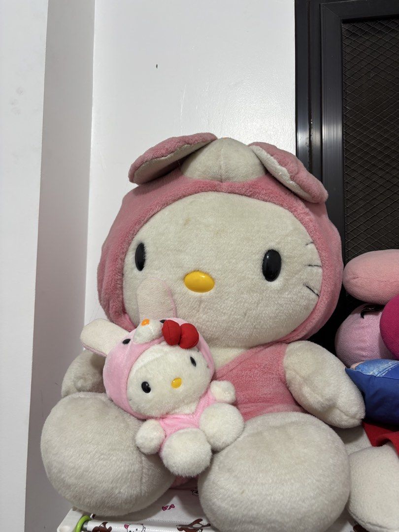 Humansize and Small Hello Kitty Plush Toys (Category: Plushies & Soft Toys) located in Manila. Submitted by robbyrabbit (Listing ID 1462921423, Image 1). Description: - Large Kitty plush toy - Smaller Kitty plush toy - Both wearing adorable pink bunny outfits - Super soft and cuddly - Perfect for Kitty collectors or as a special gift.