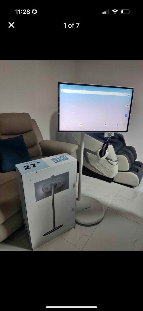 Huntech 27” portable smart TV (Category: TV) located in Paranaque City. Submitted by engrmike (Listing ID 1462955122, Image 1). Description: - Huntechmonitor stand compatible with 27" screens. - Comes with power adapter and cables. - Features a clean white finish and a stable circular base. - Ideal for setting up your monitor without the need for a desk mount. - Please handle with care; avoid stacking or dropping..