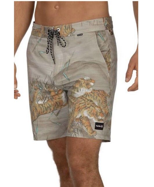 Hurley beachside islander tiger print short (Category: Swim Trunks & Board Shorts) located in El Nido. Submitted by marco.tandoc (Listing ID 1463020452, Image 1). Description: size: 34 waist: 34-36 length: 18 no issue with side pocket & back pocket.