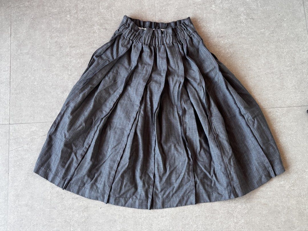 Initial Grey Pinstripe Pleated Midi Skirt (Category: Skirts) located in Apalit. Submitted by orchid555_ (Listing ID 1462944657, Image 1). Description: - Grey midi skirt - Pinstripe detail - All-around pleats - elastic waistband.