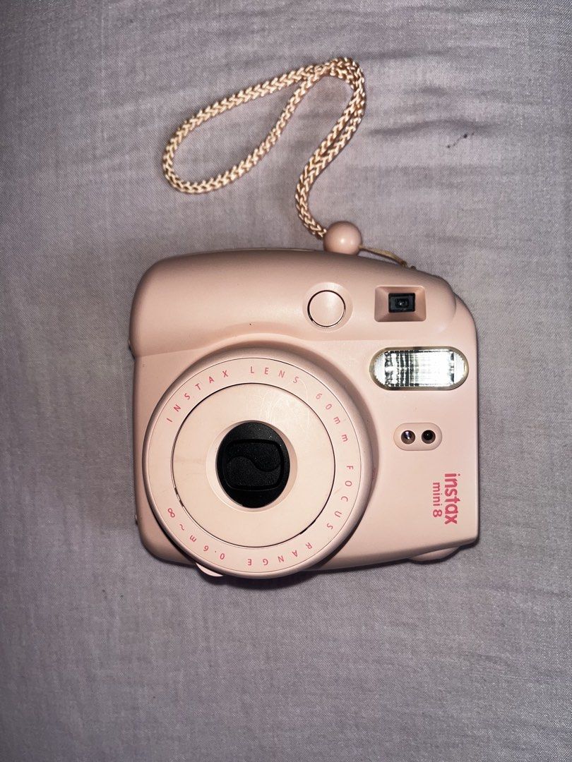 Instax mini 8- pink (Category: Cameras) located in Manila. Submitted by lotuslilies_177 (Listing ID 1462907412, Image 1). Description: Fujifilm Instax Mini 8 instant camera in pink.Includes a wrist strap,transparent hard case with strap. Requires two AA batteries (not included). The camera has a built-in flash and a lens with a focus range.Works and looks like new very maingat ang gumamit.dm for more details.
