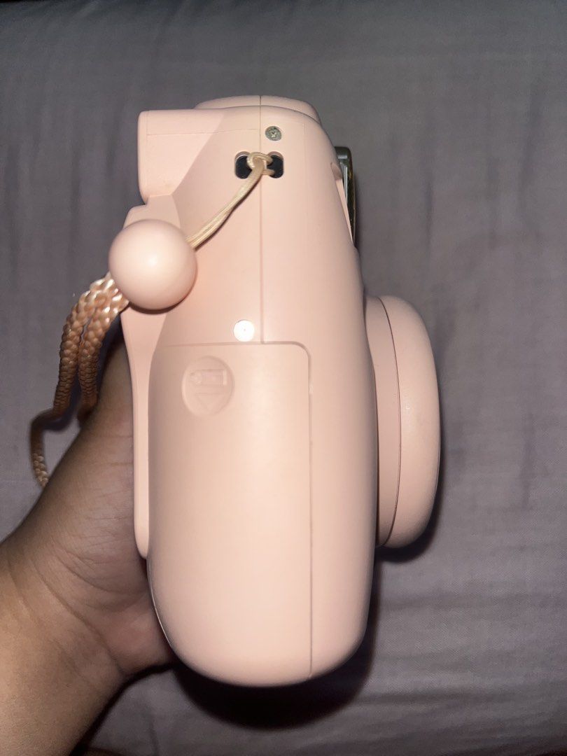 Instax mini 8- pink (Category: Cameras) located in Manila. Submitted by lotuslilies_177 (Listing ID 1462907412, Image 3). Description: Fujifilm Instax Mini 8 instant camera in pink.Includes a wrist strap,transparent hard case with strap. Requires two AA batteries (not included). The camera has a built-in flash and a lens with a focus range.Works and looks like new very maingat ang gumamit.dm for more details.