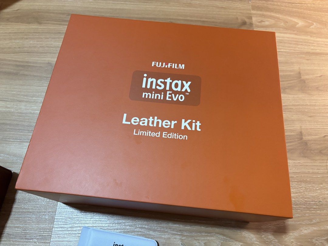 Instax Mini Evo Leather Kit Limited Edition (Category: Cameras) located in Pasig City. Submitted by averie29 (Listing ID 1463019134, Image 2). Description: • Bought January 2026 for ₱14,000 • Good as new, barely used! • No issues • Works as both camera and printer • Includes camera case, 32GB SD card, photo frames, and photo album RFS: Barely used.