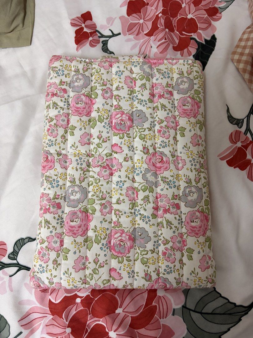 Ipad pouch (Category: Other Stationery & Craft) located in Subang Jaya. Submitted by nkirwan (Listing ID 1462988872, Image 2). Description: - Handmade iPad pouch with a charming floral print. - Features pink roses and delicate blue flowers. - Padded design for device protection. - Ideal for iPads or tablets. - Available for mailing or self-pickup in Subang Jaya..