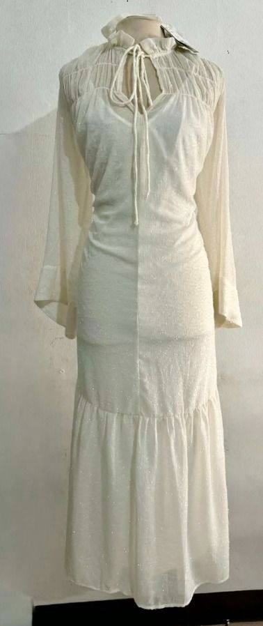 Ivory Long-sleeve Maxi Dress (Category: Dresses) located in Manila. Submitted by hyper.hertz. (Listing ID 1463019394, Image 1). Description: - Elegant white maxi dress - Sparkly textured fabric - Flowy and chic silhouette - Long bell sleeves - Ruffled neckline with tie detail Negotiations are available.