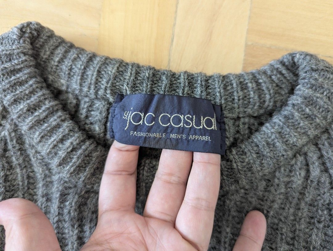Jac Casual Grey Ribbed Knit Sweater (Category: Coats, Jackets and Outerwear) located in Taguig. Submitted by hlco13 (Listing ID 1462959600, Image 2). Description: - Brand: Jac Casual - Color: Grey - Material: Ribbed Knit - Style: Men's Sweater - Features: Long sleeves, ribbed cuffs, crew neck - Benefits: Comfortable, warm, versatile for layering or solo wear.