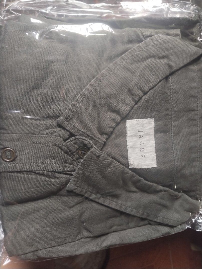 JACHS long sleeve (Category: Tshirts & Polo Shirts ) located in Manila. Submitted by juanayesha1713 (Listing ID 1462959660, Image 1). Description: - Brand: JACHS - Color: Dark Grey - Style: Button-up shirt - Material: Sturdy cotton twill - Condition: Brand new, in original packaging - Perfect for: Casual wear.
