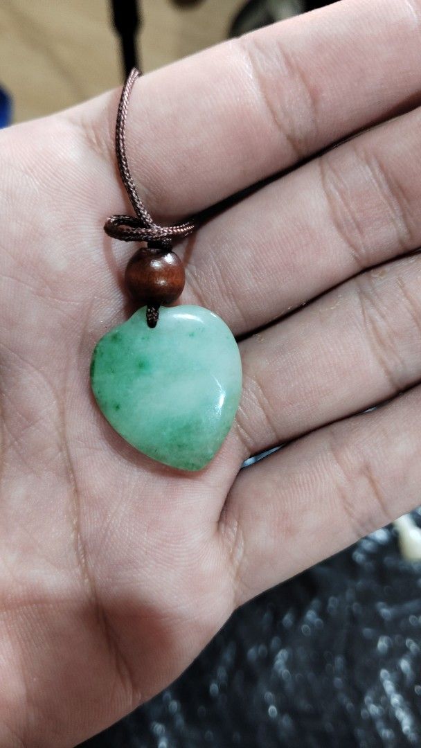 Jade Bangles, Pendant, and Charm Set (Category: Necklaces) located in Baguio. Submitted by maryhazel.22 (Listing ID 1463016031, Image 3). Description: - Set includes: 2 jade bangles (one with a carved charm) - 1 heart-shaped green jade pendant on a cord - 1 small carved jade charm - Each piece features natural variations in color and pattern - Ideal for personal collection or as a thoughtful gift -For take all.