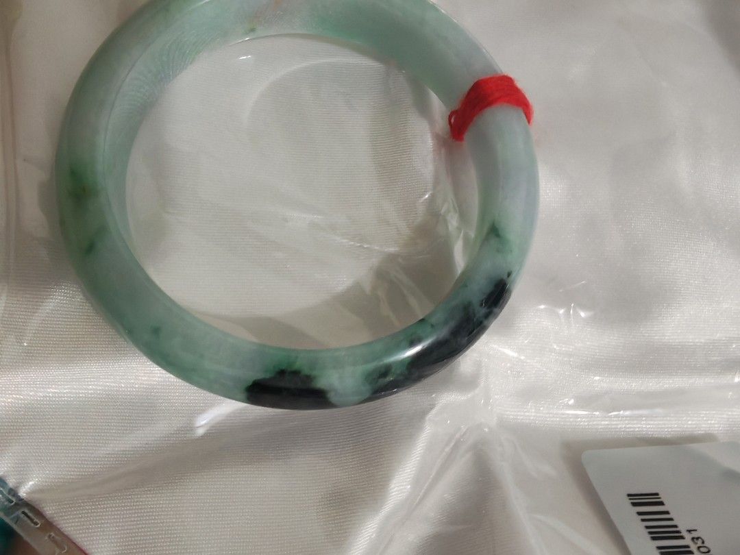 Jadeite Bangle (Category: Bracelets) located in Bacoor. Submitted by jadeitemaster (Listing ID 1463066543, Image 3). Description: This is only one Apple green with flower Well polished. Cheaper price because have stone lines, no crack! Semi icy. Smooth surface, no skin. Size: 55.9 or 56 No discount this item is intended for Japan sale, so only available for a limited time!.