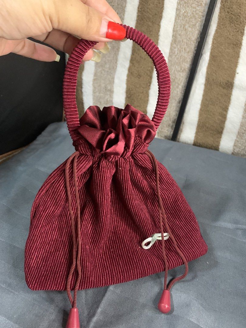Japan string Hand pouch (Category: Purses & Pouches) located in Cabanatuan. Submitted by mjluxxejapan (Listing ID 1462998372, Image 1). Description: Fixed price approx 7.5”x7” meas kasya cp Like new cond maroon color .