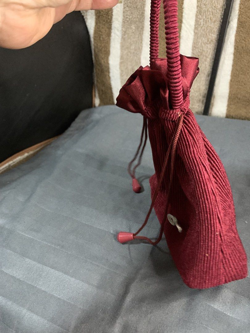 Japan string Hand pouch (Category: Purses & Pouches) located in Cabanatuan. Submitted by mjluxxejapan (Listing ID 1462998372, Image 3). Description: Fixed price approx 7.5”x7” meas kasya cp Like new cond maroon color .