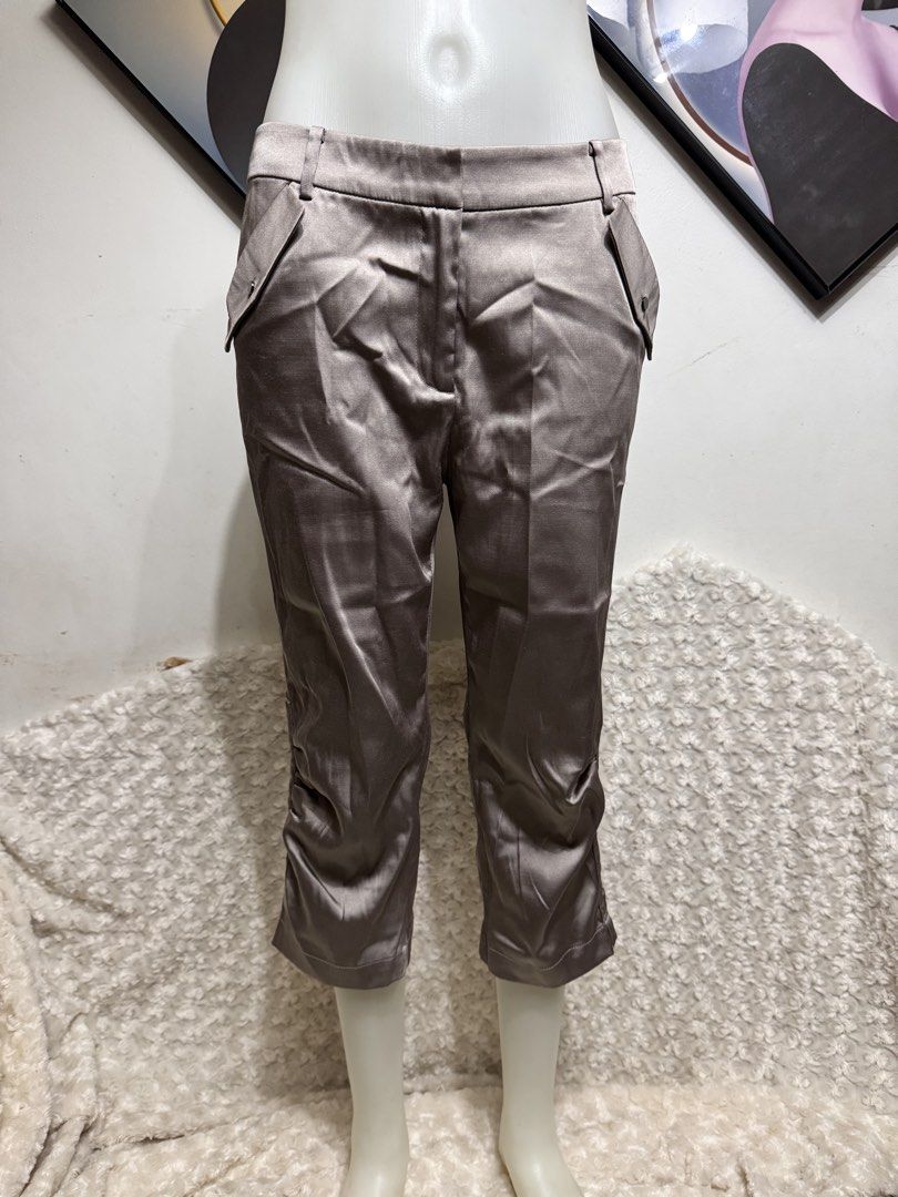 JESSIE® elegant Satin Capri Pants - Silver/Grey (Category: Other Bottoms) located in Marikina City. Submitted by lorradel (Listing ID 1462897661, Image 1). Description: - JESSIE® satin capri pants padala from US - never used - W: 30-32 L: 27.5in - Cool silver-grey color - Cropped length - Ruched detail at the hem - Front and back pockets - Perfect for dressing up or down -mannequin length waist to top ankle 38 in ; to floor 41 inches - MAY HAVE s