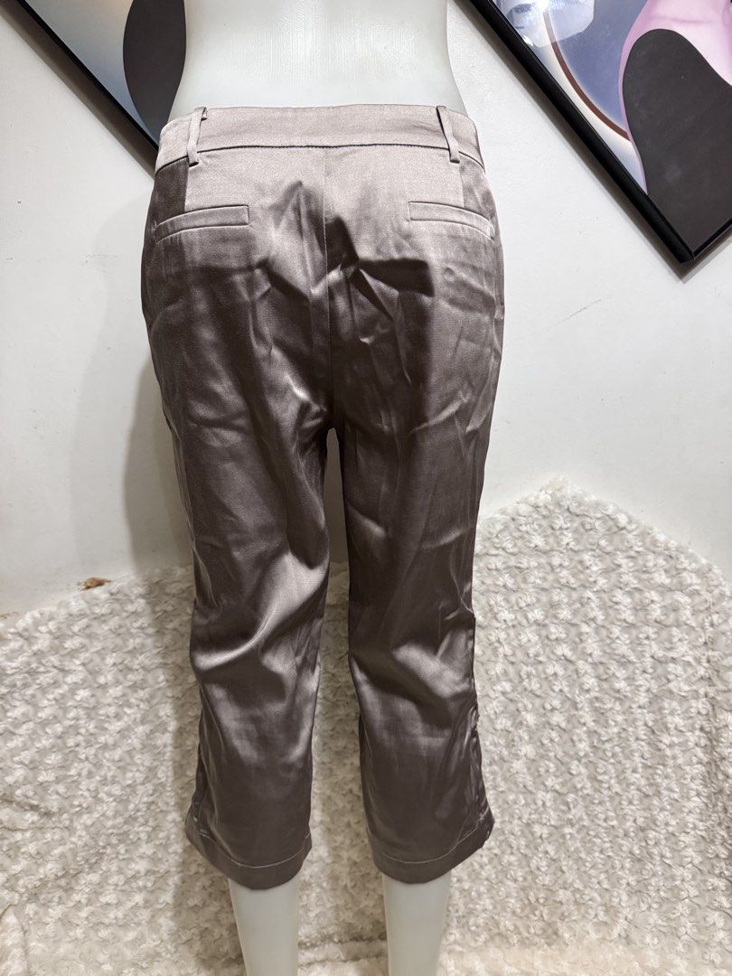 JESSIE® elegant Satin Capri Pants - Silver/Grey (Category: Other Bottoms) located in Marikina City. Submitted by lorradel (Listing ID 1462897661, Image 3). Description: - JESSIE® satin capri pants padala from US - never used - W: 30-32 L: 27.5in - Cool silver-grey color - Cropped length - Ruched detail at the hem - Front and back pockets - Perfect for dressing up or down -mannequin length waist to top ankle 38 in ; to floor 41 inches - MAY HAVE s
