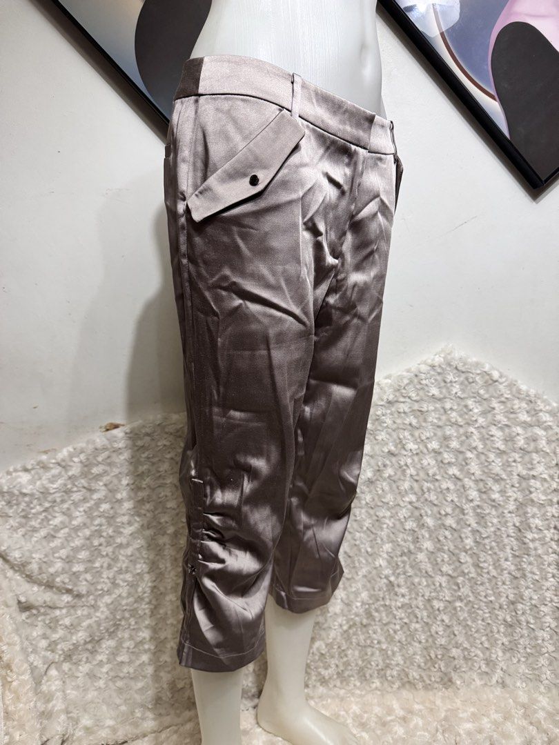 JESSIE® elegant Satin Capri Pants - Silver/Grey (Category: Other Bottoms) located in Marikina City. Submitted by lorradel (Listing ID 1462897661, Image 2). Description: - JESSIE® satin capri pants padala from US - never used - W: 30-32 L: 27.5in - Cool silver-grey color - Cropped length - Ruched detail at the hem - Front and back pockets - Perfect for dressing up or down -mannequin length waist to top ankle 38 in ; to floor 41 inches - MAY HAVE s