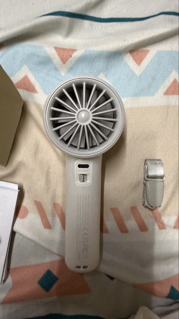 Jisulife 10s Handheld Fan (Category: Fans) located in Makati City. Submitted by zari0829 (Listing ID 1463004850, Image 3). Description: - Portable Jisulife handheld fan - Includes lanyard for easy carrying - Comes with USB charging cable - Multiple speed settings - Box and manual included - Works well, keeps you cool on the go -Never used, opened and tested only -With free silicone cover already.