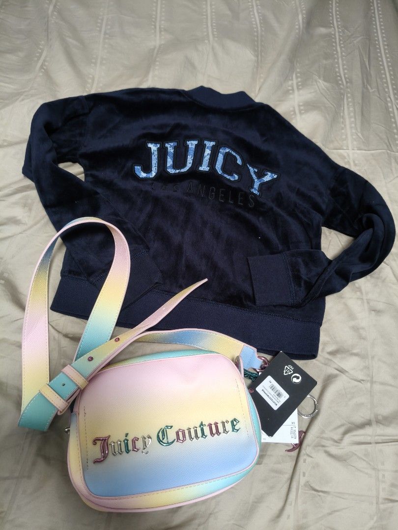 Juicy Couture Velour Track Jacket & Rainbow Bag Set (Category: Coats, Jackets and Outerwear) located in San Fernando. Submitted by pollygirl08 (Listing ID 1462947128, Image 1). Description: - Brand: Juicy Couture - Jacket Color: Navy Blue - Jacket Style: Velour Bomber - Jacket Detail: Gold Zipper - Included Accessory: Rainbow Gradient Crossbody Bag - Condition: Brand new with tags attached - Ideal for: Juicy Couture enthusiasts.
