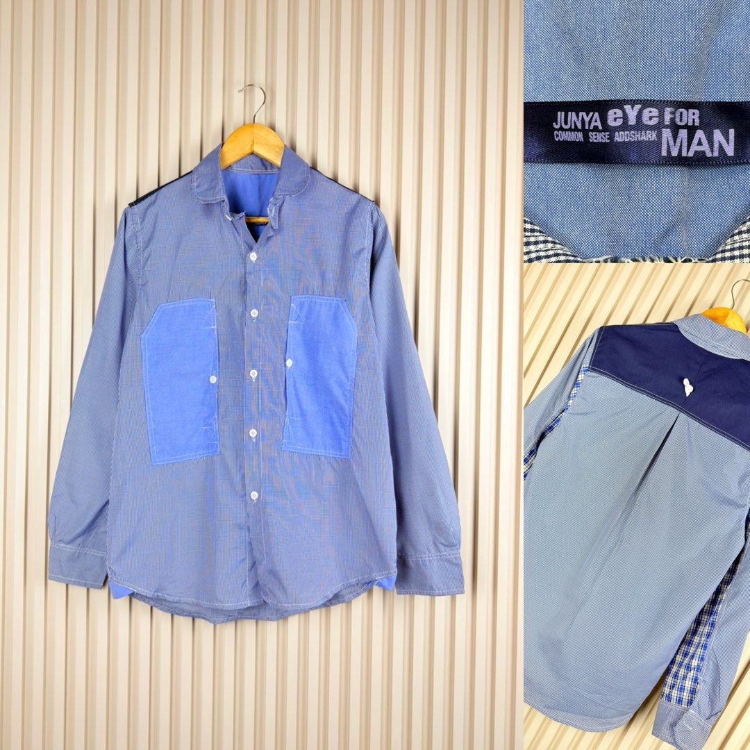 JUNYA eye for MAN Blue Gingham Patchwork Shirt (Category: Tshirts & Polo Shirts ) located in Pasig City. Submitted by trendapparelph (Listing ID 1463033794, Image 1). Description: - JUNYA eye for MAN cool blue gingham shirt - Contrasting blue patch pockets on the front - Navy panel with small white embroidered detail on the back - Unique patchwork design - Ideal for a casual look.
