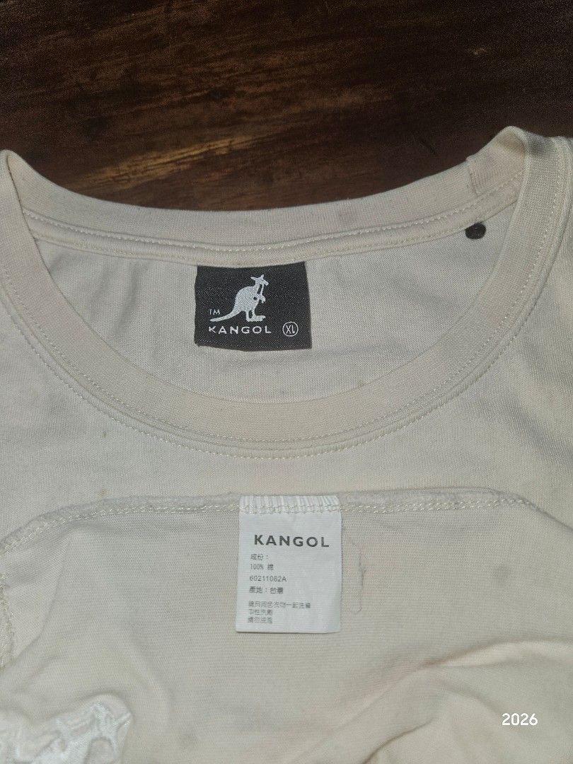 Kangol Size XL (Dark Spots are from CAMERA) (Category: Tshirts & Polo Shirts ) located in Bislig. Submitted by edisontv (Listing ID 1463009526, Image 3). Description: - FREE SHIPPING FEE - OPEN FOR VIDEO CALL - Light Cream colored long sleeve t-shirt - Brand: Kangol - Features Kangol logo on chest - Small Union Jack flag detail on sleeve - Size: XL - Condition: Minor faint marks (please check photos for details).