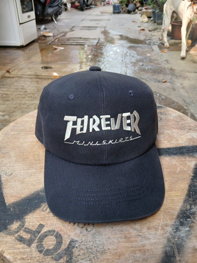 Kapital "Forever" Embroidered Baseball Cap (Category: Caps & Hats) located in Caloocan City. Submitted by youngmoon_51e2c6 (Listing ID 1462986098, Image 1). Description: - Dark navy baseball cap - "FOREVER" and "MINLSKIRTS" embroidery on front - Kapital brand tag on inner band - Classic six-panel construction with button top - Adjustable strap at the back for a custom fit - Ideal for everyday casual wear AUTHENTIC.