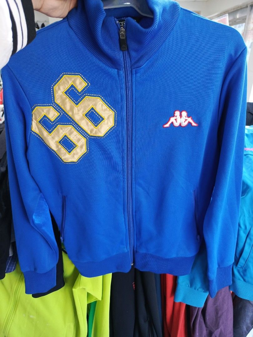 Kappa Argentina '66 Track Jacket Blue Medium (Category: Coats, Jackets and Outerwear) located in Cabatuan. Submitted by penthegreat (Listing ID 1463112358, Image 1). Description: - Blue Kappa track jacket - Features Argentina '66 graphic - Full zip front with pockets - Ribbed collar, cuffs, and hem - Made of 100% cotton - Tagged as Medium - Ideal for casual wear or sports.