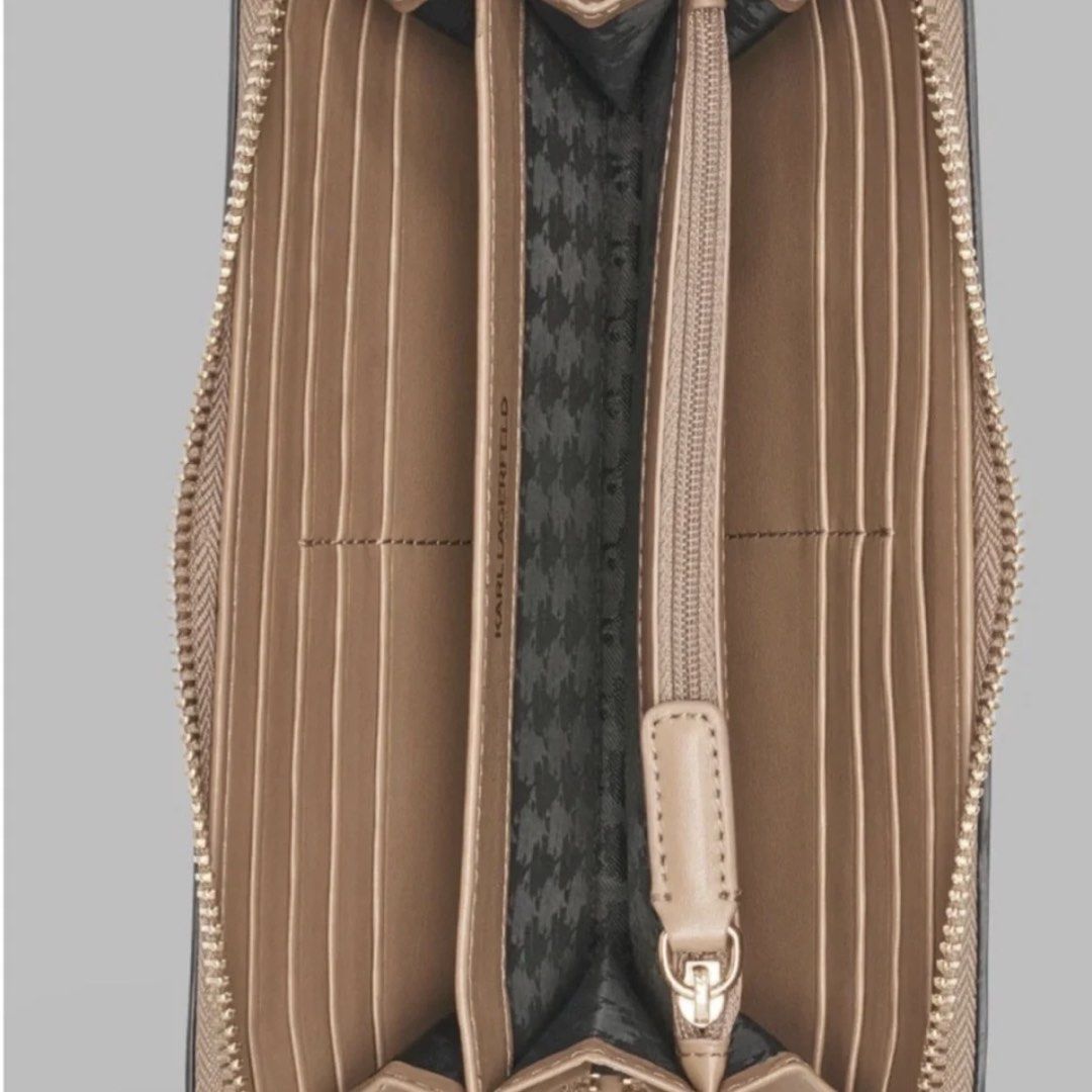 Karl Lagerfeld (Category: Luxury Bags & Wallets) located in Del Monte. Submitted by loryelletee (Listing ID 1463030759, Image 2). Description: 💚 Karl Lagerfeld Paris Tan Zip Around Wallet Gol Pins Charms 💚Brand new with tag 💚100% Authentic 💚Fresh from U.S 💚On Hand 💚Php 4,500 💚Brand new Karl Lagerfeld Paris zip-around wallet in tan with playful gold-tone pins and iconic Karl character detailing. Features a pebbled texture, full zip-around c