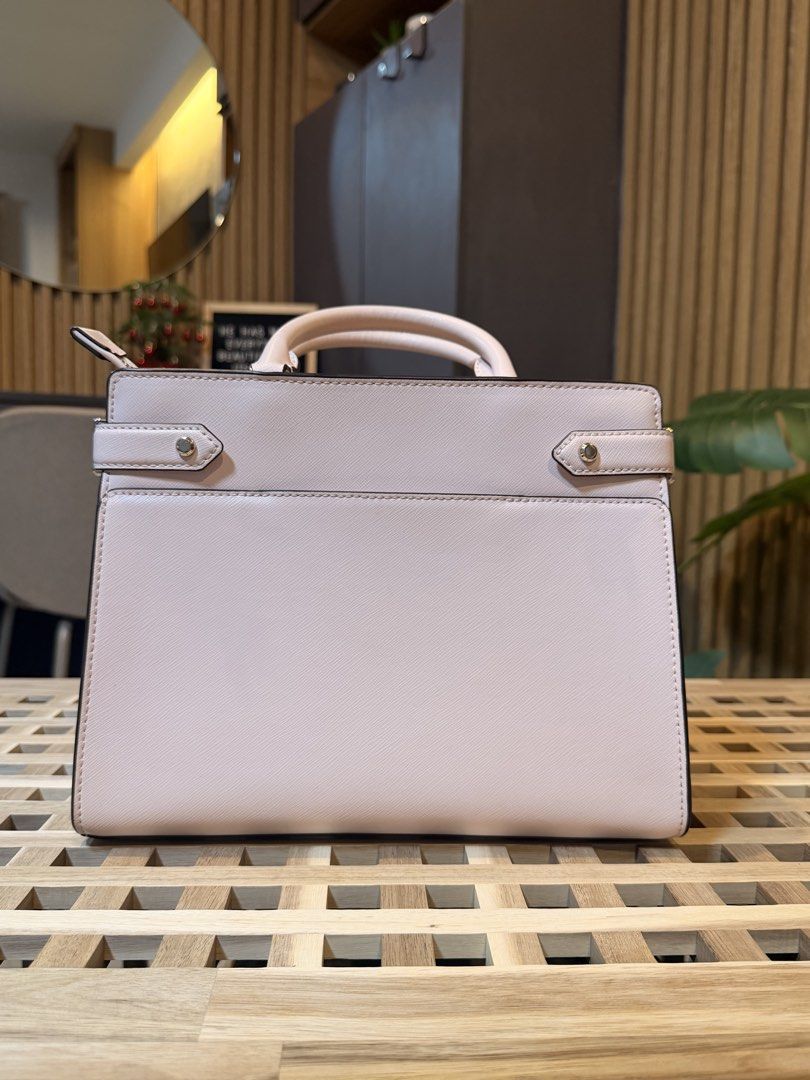 Kate Spade Staci medium satchel (Category: Tote Bags) located in Pasig City. Submitted by mandks (Listing ID 1462886991, Image 3). Description: SALE: ₱3,500 + sf only 🔥 Kate Spade Staci medium satchel 9.5/10 - my personal favoriiiite 🩷🩷🩷 See last photo for a very minor flaw Exterior slip pockets Interior zip and slip pockets Comes with an adjustable strap See last 2 photos for size reference Very makiniiiis!! 🥹 ₱3,700 + shipping fee (J&T/Lal