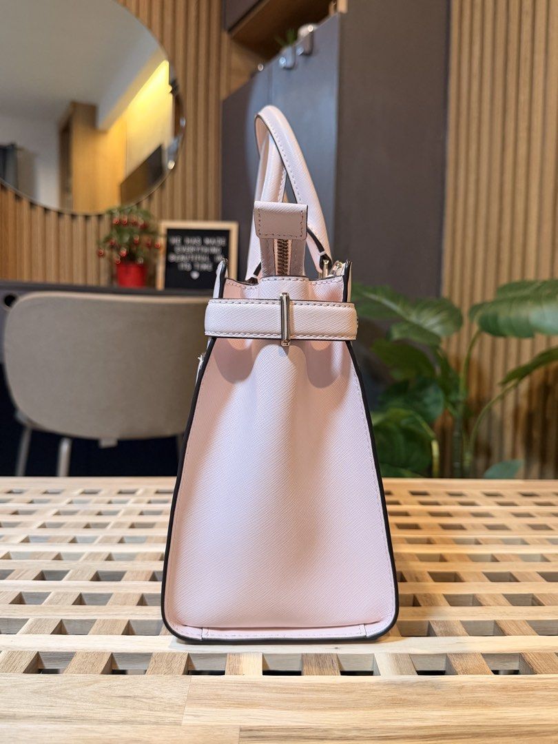 Kate Spade Staci medium satchel (Category: Tote Bags) located in Pasig City. Submitted by mandks (Listing ID 1462886991, Image 2). Description: SALE: ₱3,500 + sf only 🔥 Kate Spade Staci medium satchel 9.5/10 - my personal favoriiiite 🩷🩷🩷 See last photo for a very minor flaw Exterior slip pockets Interior zip and slip pockets Comes with an adjustable strap See last 2 photos for size reference Very makiniiiis!! 🥹 ₱3,700 + shipping fee (J&T/Lal