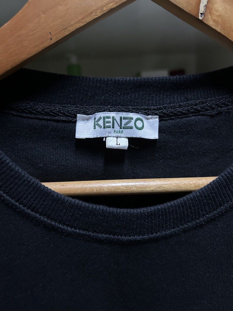 Kenzo black sweatshirt (Category: Coats, Jackets and Outerwear) located in Quezon. Submitted by duculanjay (Listing ID 1462969056, Image 2). Description: Med to large Condition 7/10.