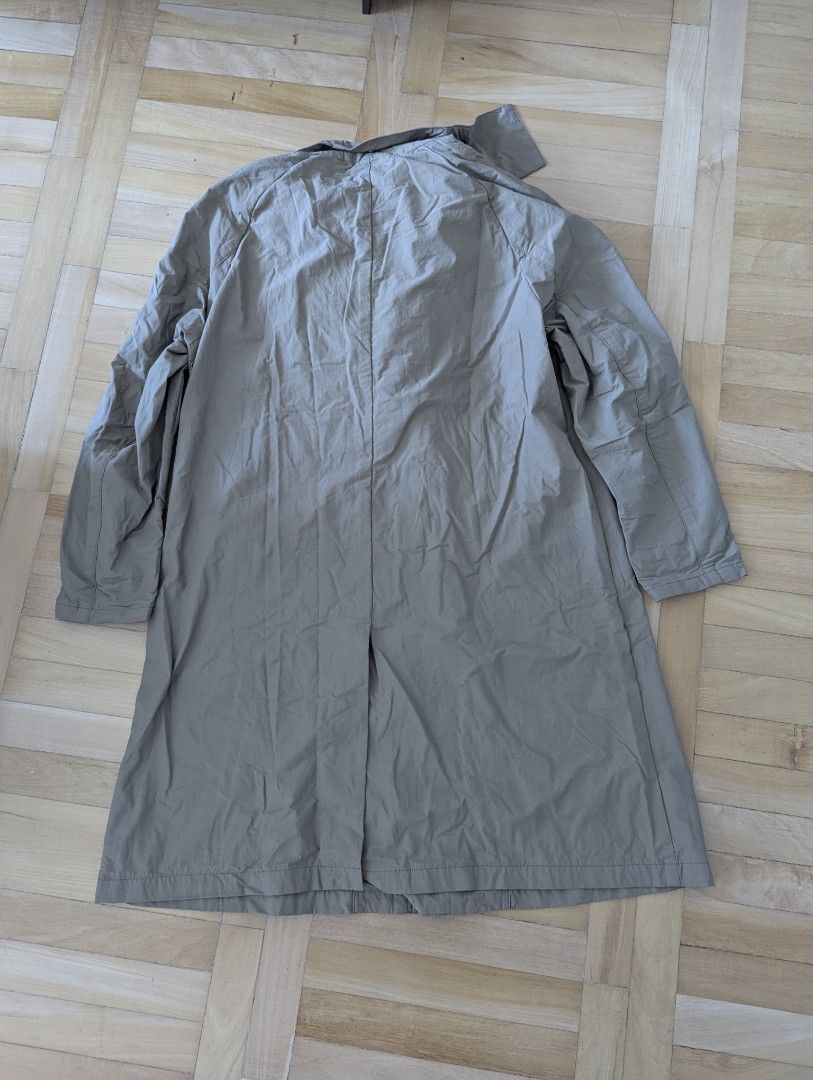 Khaki Hooded Trench Coat Size M (Category: Coats, Jackets and Outerwear) located in Taguig. Submitted by hlco13 (Listing ID 1462960807, Image 3). Description: - Khaki hooded trench coat - Size M - Button-up front with zip closure underneath - Two front pockets with button closures - Adjustable drawstring at the hood - Back vent for ease of movement - Ideal for rainy days.