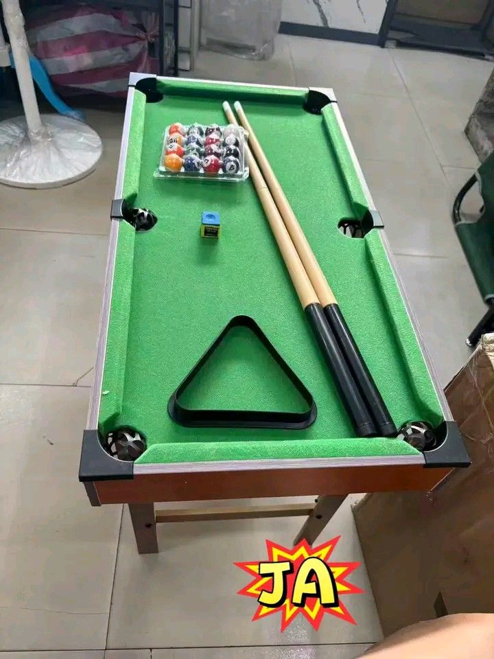 Kids Tabletop Billiard Pool Table Set with Accessories (Category: Kids Toys) located in Manila. Submitted by berdenmarl01688 (Listing ID 1463102938, Image 2). Description: - Fun tabletop billiard table for kids - Includes cues, balls, and rack - Easy to set up and play - Great for indoor entertainment - Dimensions: approx. 60cm x 37cm x 69cm - Perfect for young aspiring pool players.