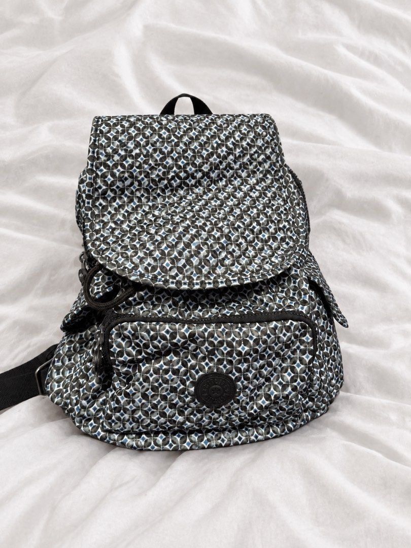 Kipling Backpack - Geometric Pattern (Category: Backpacks) located in Manila. Submitted by royalbear_87f903 (Listing ID 1462928663, Image 1). Description: Cute Kipling backpack with a geometric pattern. Lots of pockets for organizing your essentials. Adjustable straps for a comfortable fit. Great for daily use or travel. Clean and ready for a new owner..