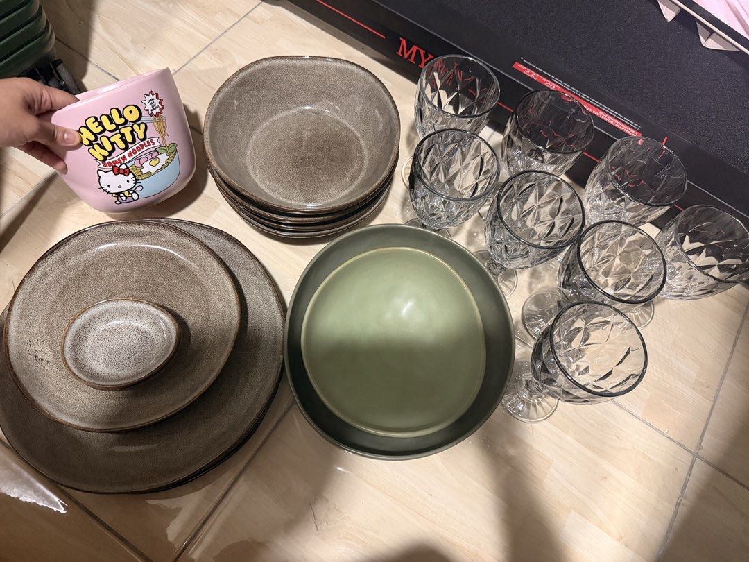 Kitchen Plus Ceramic Bowls and Plates Set (Category: Dinnerware & Cutlery) located in Mandaluyong City. Submitted by riz_040521 (Listing ID 1462916977, Image 1). Description: 24K Japanese Vintage Glossy Style Ceramic Plate Set - Kitchen Plus Ceramic Bowl & Plate Set - Rustic, earthy tones, Typo hello kitty ramen bowl, 8 pieces of glasses - Set includes: - 4 Large plates (3 plates never used) - 2 Medium Bowls(medium and large green) - 3 Small plat