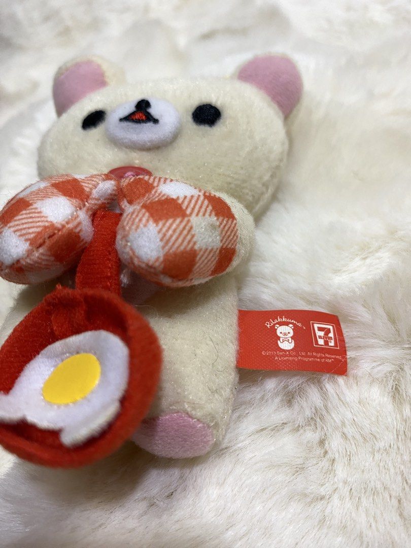 Korilakkuma 7-Eleven Plush Keychain with Fried Egg (Category: Plushies & Soft Toys) located in Kalibo. Submitted by ollie_stuffshop (Listing ID 1463085454, Image 3). Description: Before you send your inquiries: ❗️Last Price is already posted ❗️Manage your expectations, WYSIWYG ❗️May need washing ❗️Dropoff is every Wednesday & Sunday - Adorable Korilakkuma plush keychain - Features the bear character holding a fried egg in a pan - Cute details: re