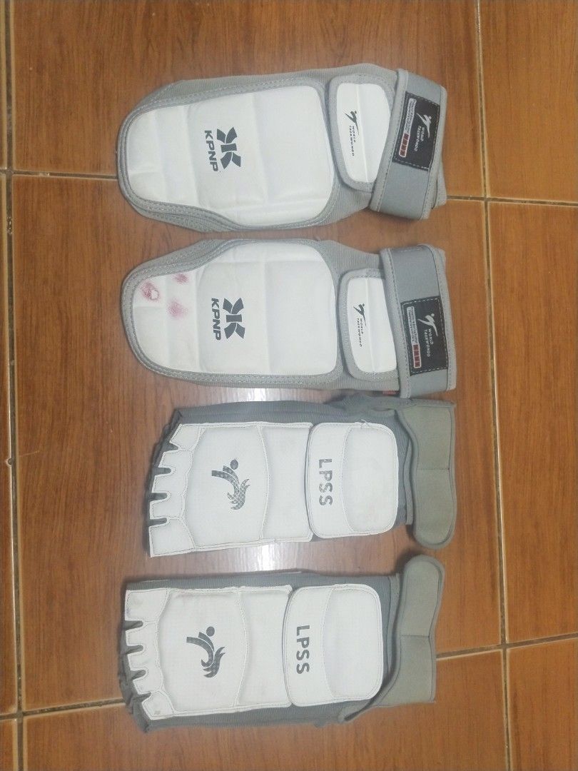 KPNP & LPSS Taekwondo foot gloves (Category: Combat Sports) located in Quezon City. Submitted by benedictobaricaua032284 (Listing ID 1463103473, Image 1). Description: used.
