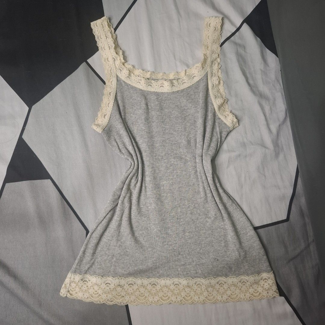 Laced trim cotton sleeves top (Category: Activewear) located in Adams. Submitted by frog_and_clover (Listing ID 1462924217, Image 1). Description: Laced trim cotton sleeveless top, can fit small to medium size. what you see is what you get.