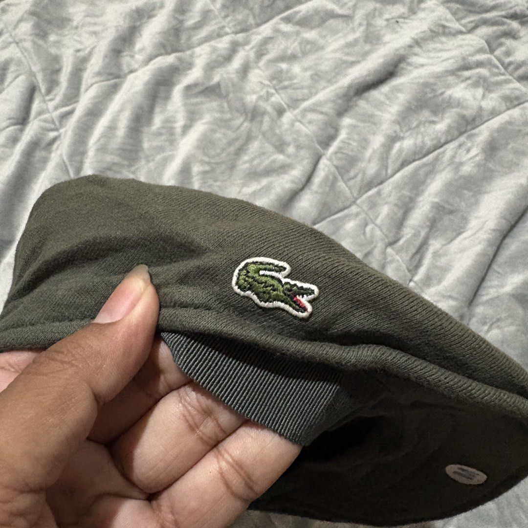 Lacoste Flat Cap Hat Green Size M (Category: Caps & Hats) located in Carmen. Submitted by rr_thrifts (Listing ID 1462952428, Image 3). Description: - Green Lacoste flat cap - Size: Medium (M) - Iconic embroidered crocodile logo on the side - Versatile for casual wear - Complements various outfits.