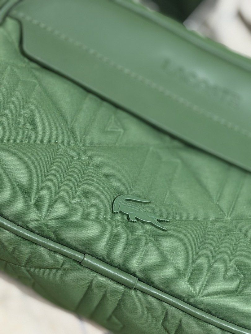 Lacoste Green Crossbody Bag (Category: Cross-body Bags) located in Manila. Submitted by hammiedos (Listing ID 1462926798, Image 2). Description: - Quilted green Lacoste crossbody bag - Adjustable strap for comfortable wear - Secure zipper closure - Interior Lacoste logo tag - Ideal for everyday essentials -original -unli check if you want Location sampaloc manila.