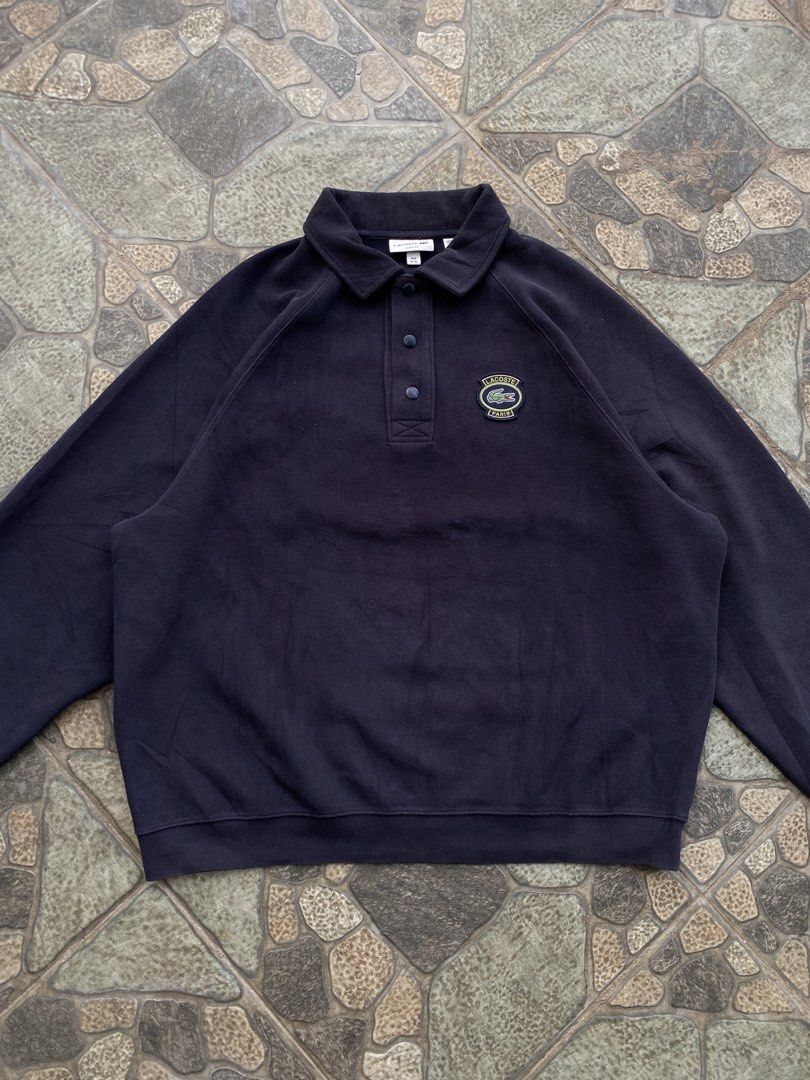 Lacoste Paris Navy Blue Sweatshirt Polo (Category: Coats, Jackets and Outerwear) located in Alicia. Submitted by wunna1_sham (Listing ID 1463000415, Image 1). Description: - Navy blue Lacoste Paris sweatshirt - Classic polo collar with button closure - Embroidered Lacoste Paris logo on the chest - Raglan sleeves for a comfortable fit - Ideal for casual wear.